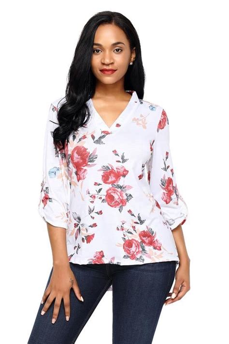 white top with red flowers.